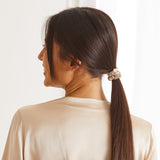 Thin silk scrunchie from Maison de la soie in caramel