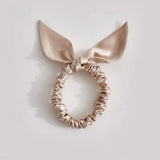Thin caramel-colored silk scrunchie made from 25-momme mulberry silk