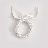 Thin white silk scrunchie with a bow, made from 25 mommes of mulberry silk