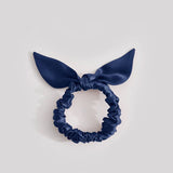 Narrow navy blue silk scrunchie made from 25-momme mulberry silk