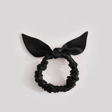 Thin black silk scrunchie with a bow, made from 25-momme mulberry silk