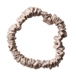 Thin caramel-colored silk scrunchie