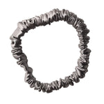 Thin silver silk scrunchie