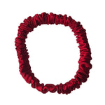 Thin red silk scrunchie