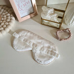 Ivory silk sleep mask with caramel trim and elastic band