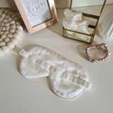 Ivory silk sleep mask with caramel trim and elastic band